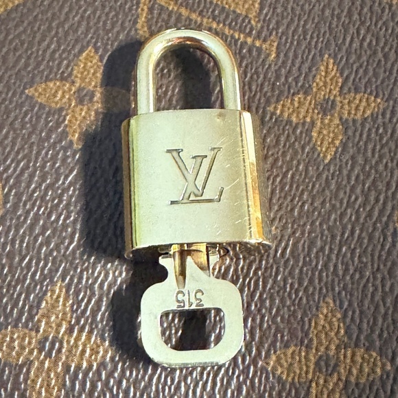 Louis Vuitton brass lock set with key #315 very good condition! Authentic - Picture 1 of 3